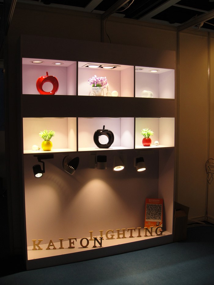Illuminated display niches with KAIFON lettering.