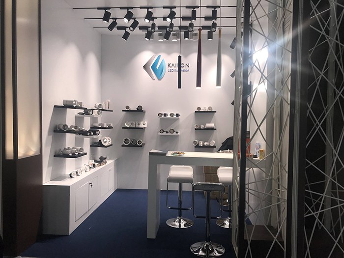 KAIFON exhibition stand with track lights and downlight display shelves.