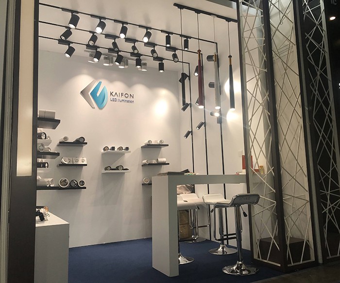 View of the KAIFON exhibition stand and suspended lighting tracks.