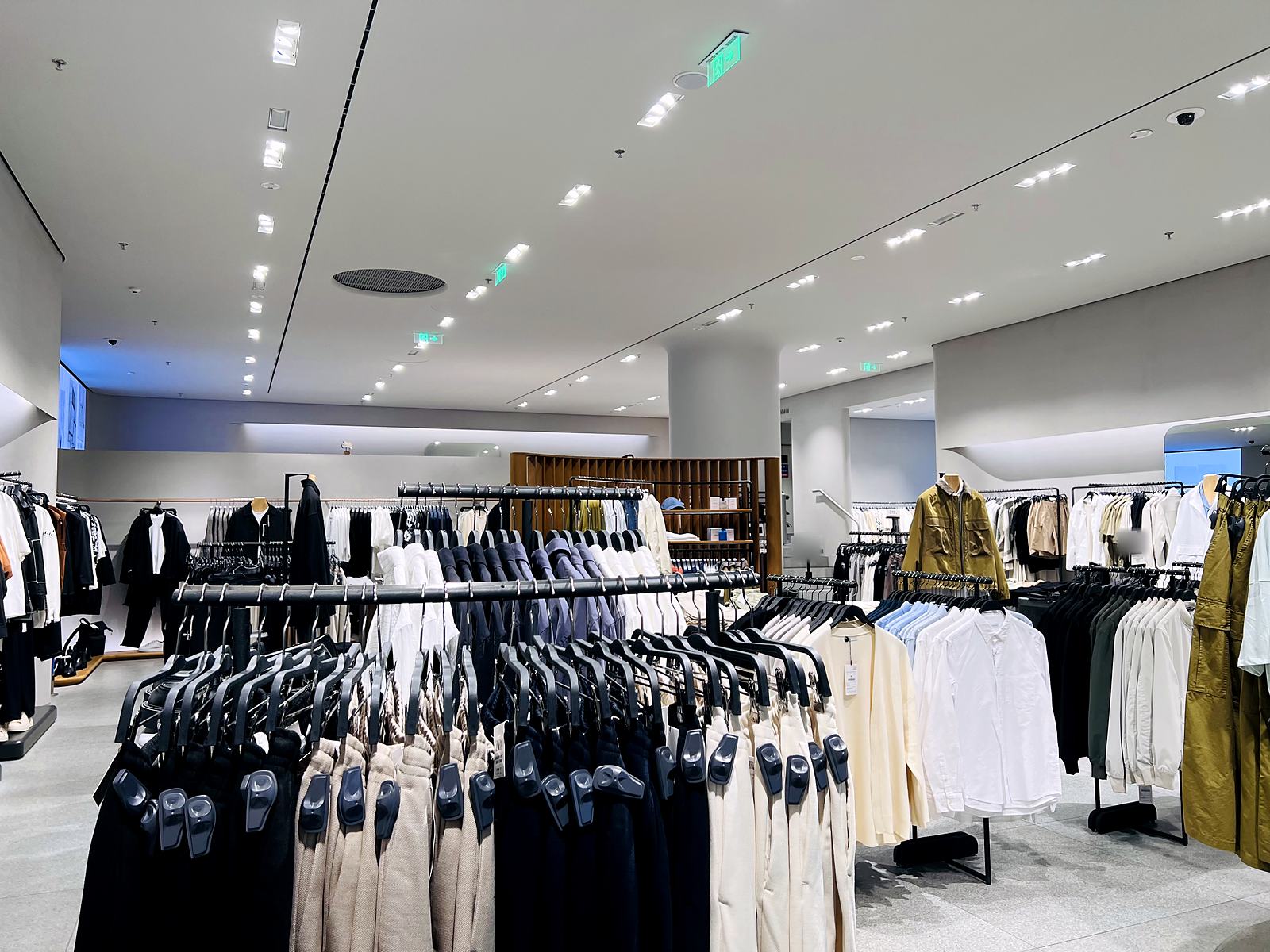 Twin-head recessed grille lights in a fashion retail interior